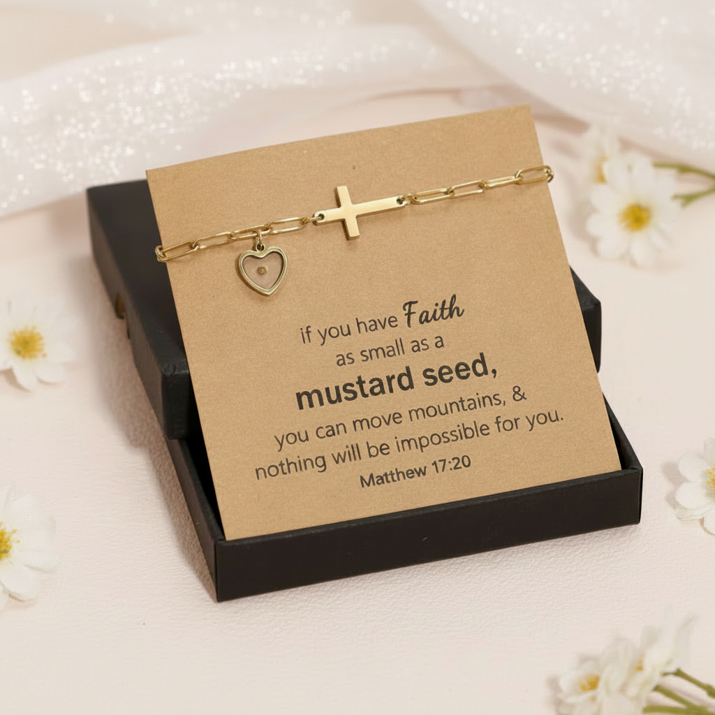 Gold bracelet with heart and cross charms on a cardboard card with a quote, on a light background